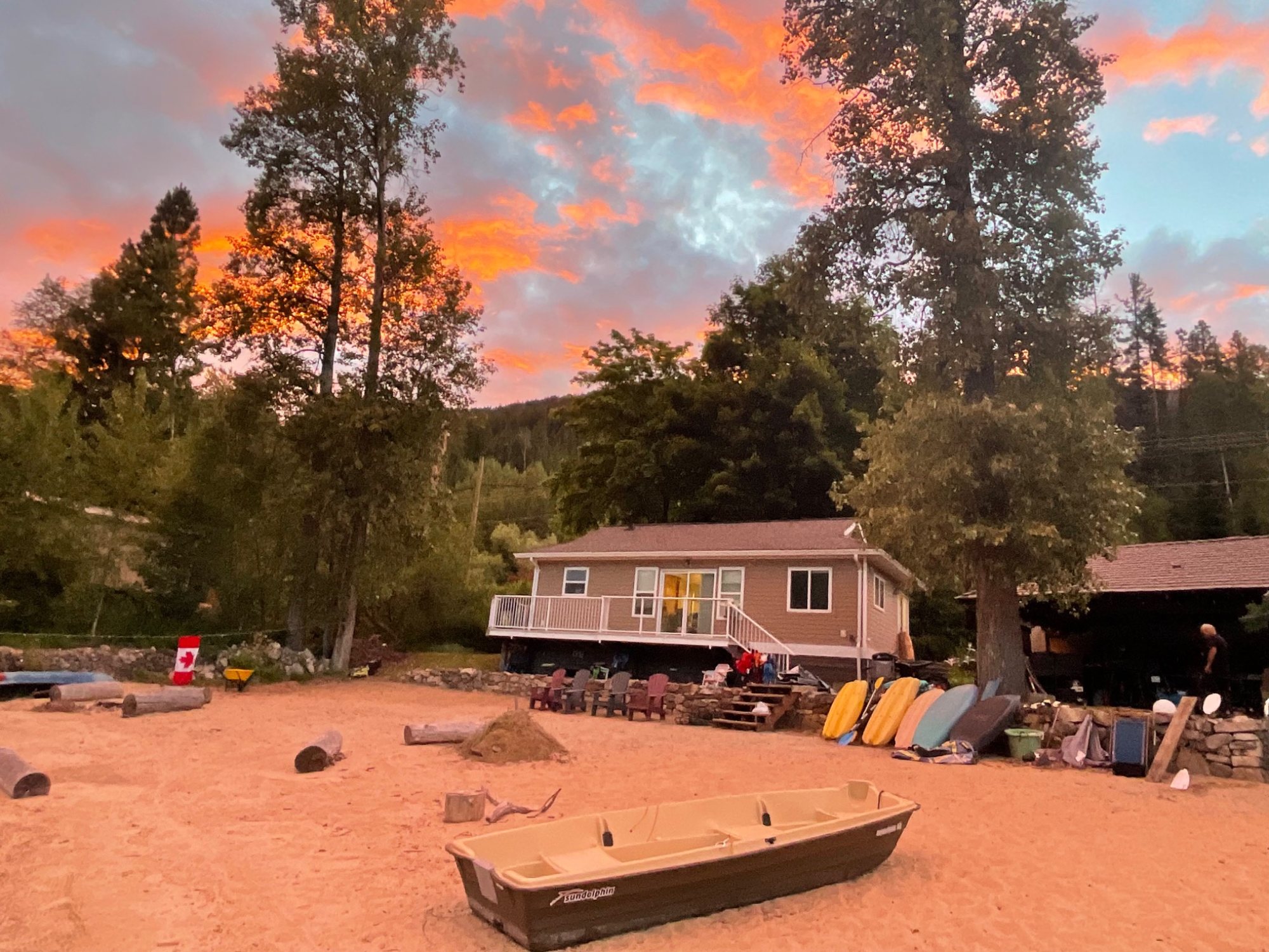 Private beach beneath a Kootenay sunset